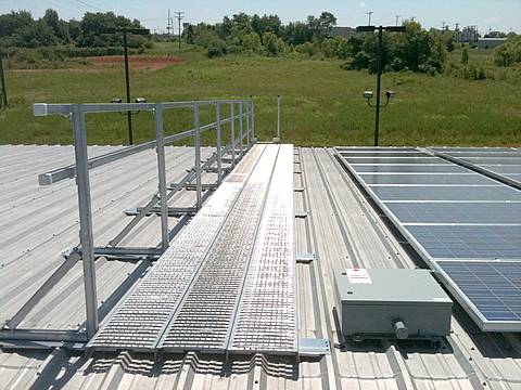 Interlock anti-skid planks are used as roof sidewalk for anti-slip.