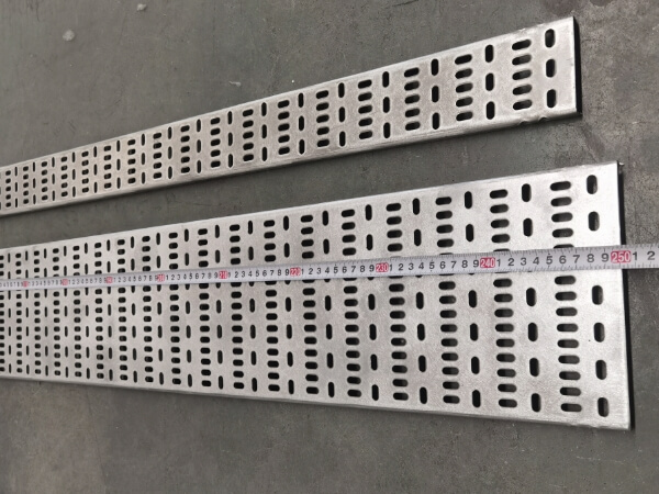 Measure perforated cable tray flat on the floor with a tape measure
